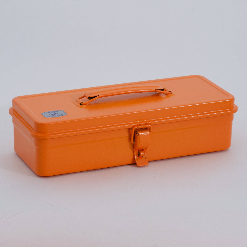 Orange toolbox with a handle on a light gray background