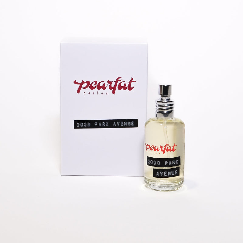 Pearfat perfume bottle and packaging on a white background