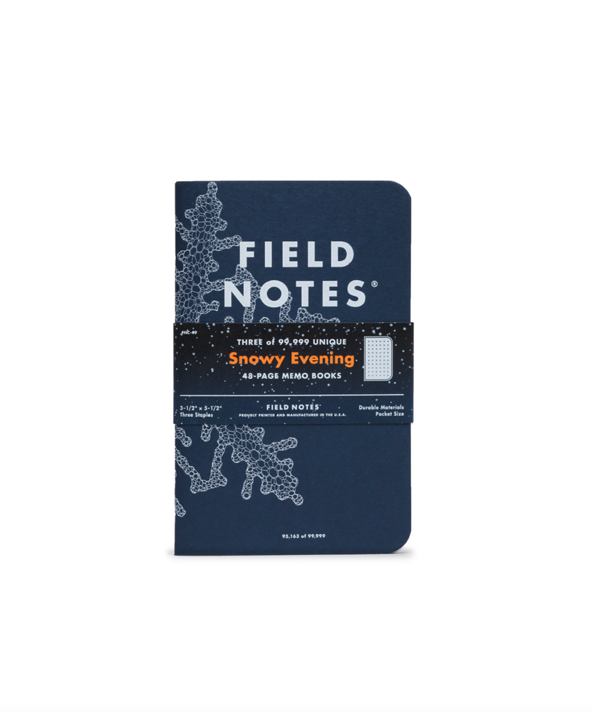 Field Notes notebook with snowy evening design on a white background