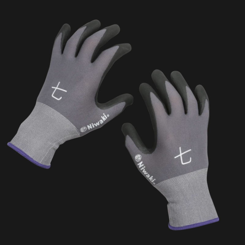 Pair of gray gloves with brand logo on a black background