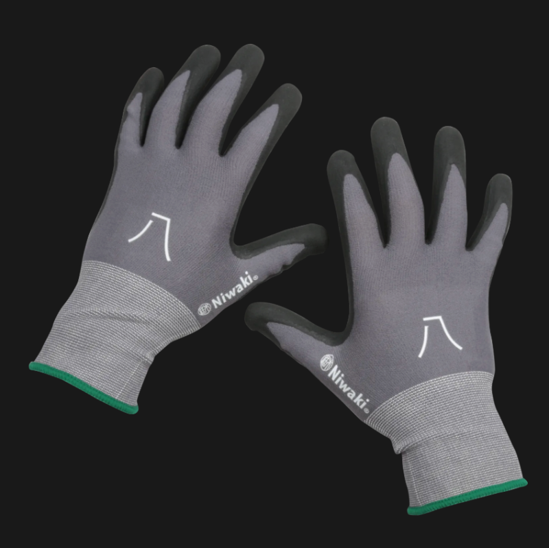 Pair of gray gloves with brand logo on a black background