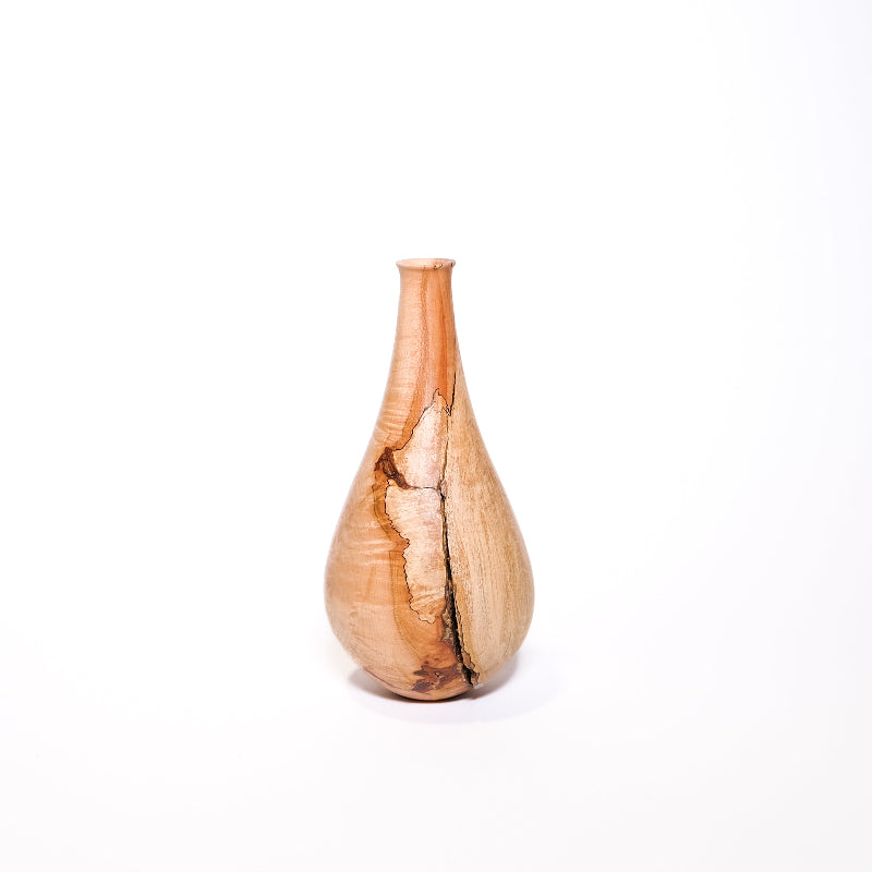 Wooden vase with natural grain patterns on a white background