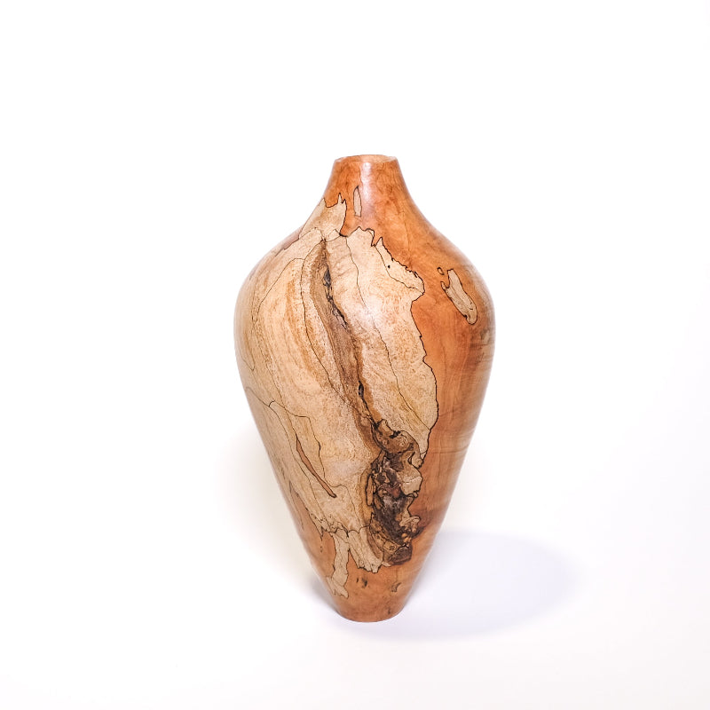 Wooden vase with natural grain patterns on a white background